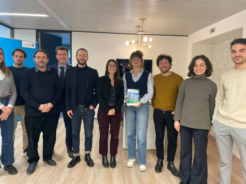 Members of the French regions' energy working group in Brussels with Romane Faure and Rémi Collombet, holding the EPBD implementation guide